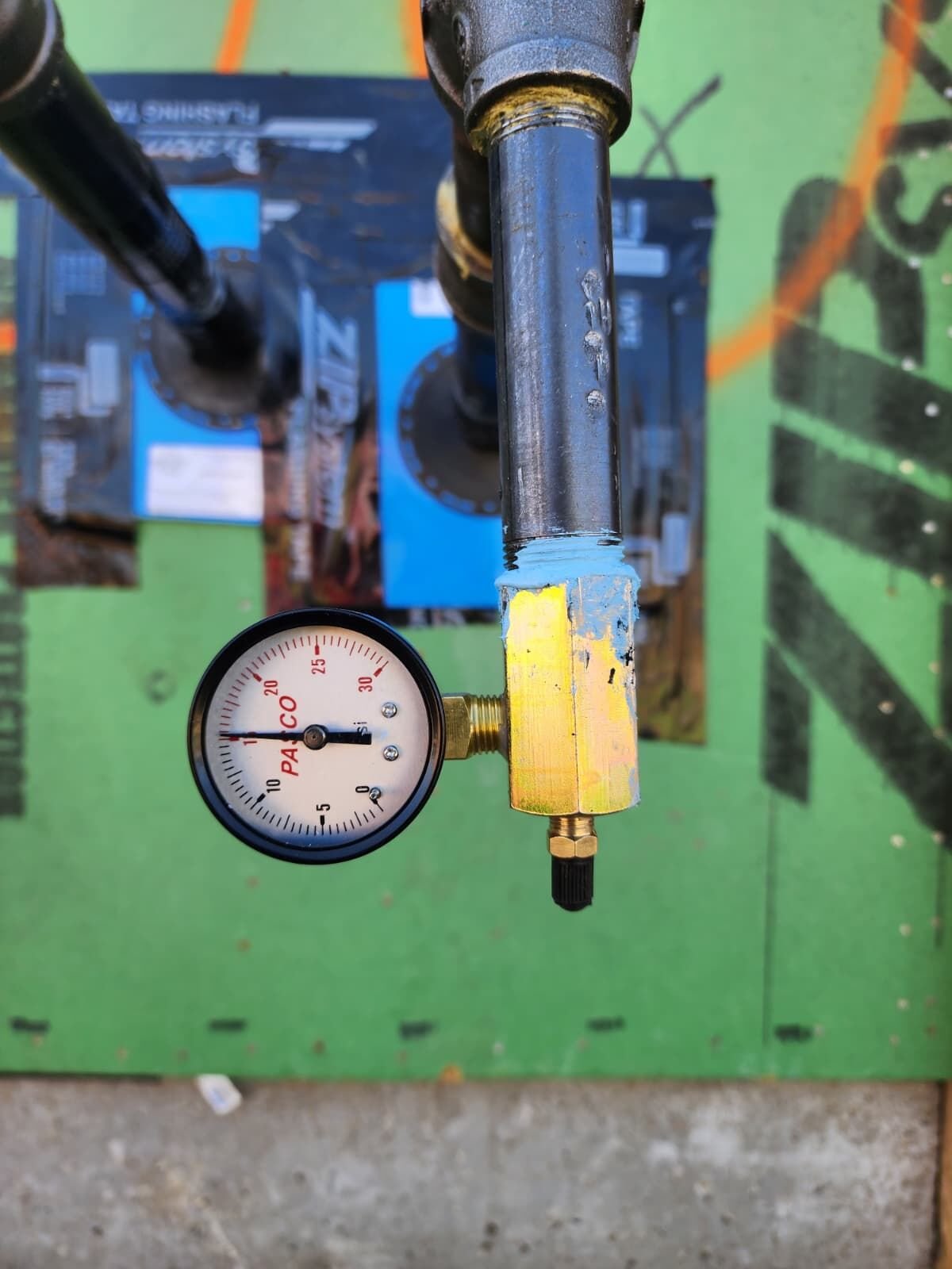 Water pressure test with gauge on a commercial rough-in