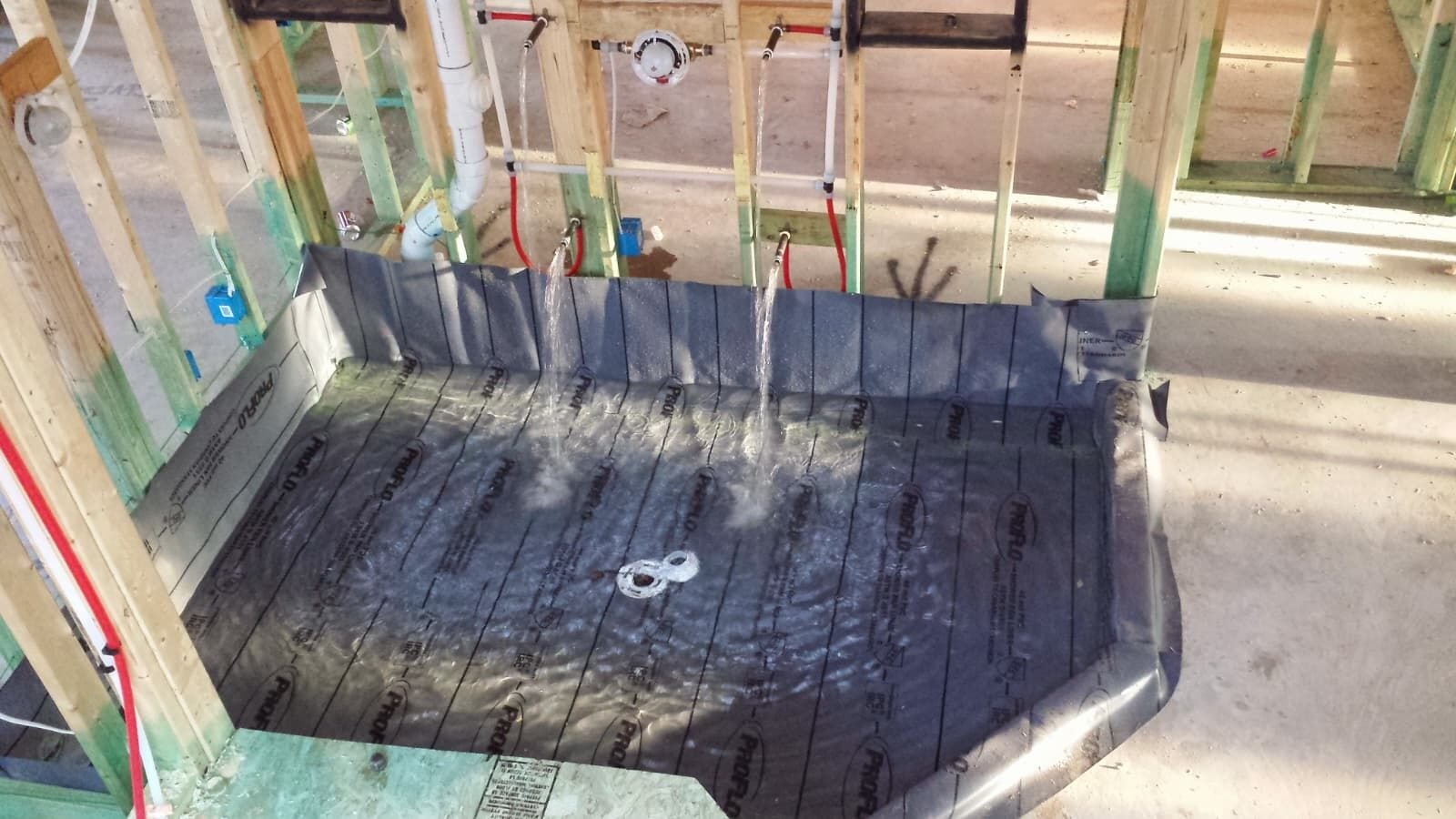 Shower rough-in with drain and pan preparation