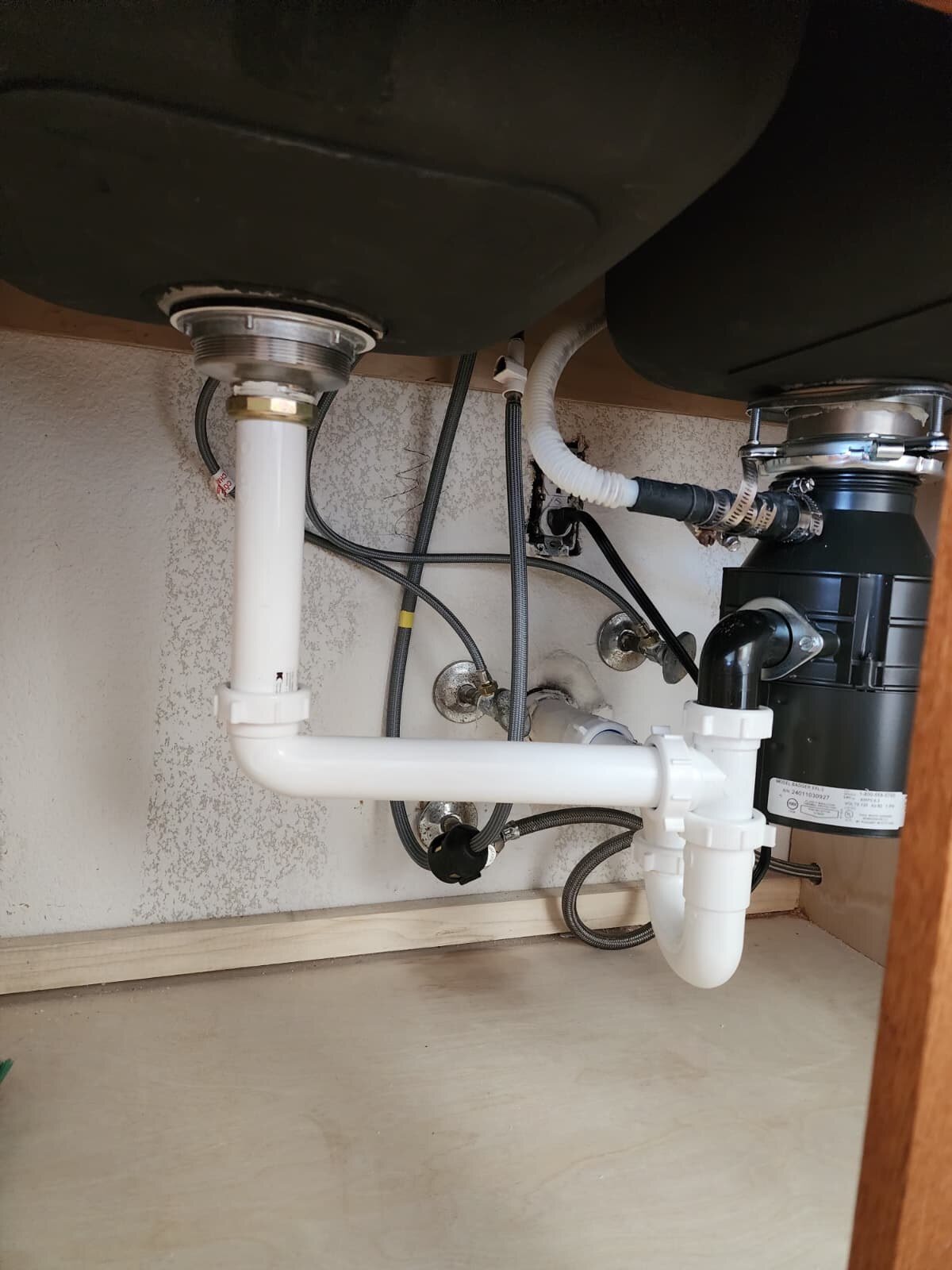 Kitchen sink plumbing with garbage disposal, P-trap and supply lines