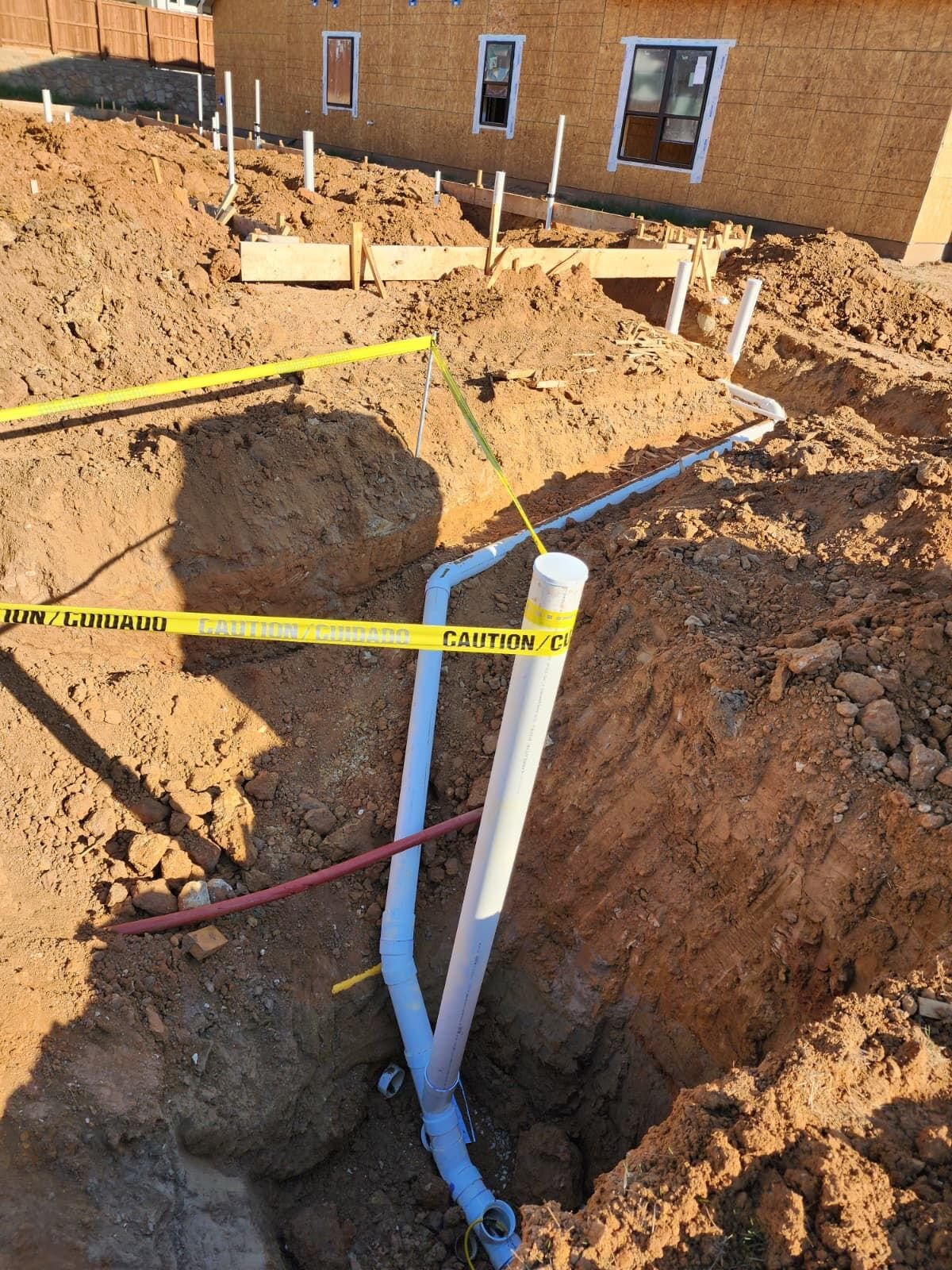 Under-slab plumbing rough-in during construction